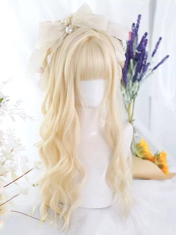 Light gold long wavy Lolita synthetic wig front view with delicate air bangs, styled with beige bow and pearl hair accessories, showing natural wavy texture against floral backdrop