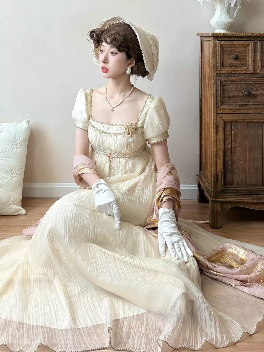 Light gold variant of purple Regency Lolita dress featuring square back neckline, puff sleeves, empire waist, champagne-tone sweet Lolita formal gown
