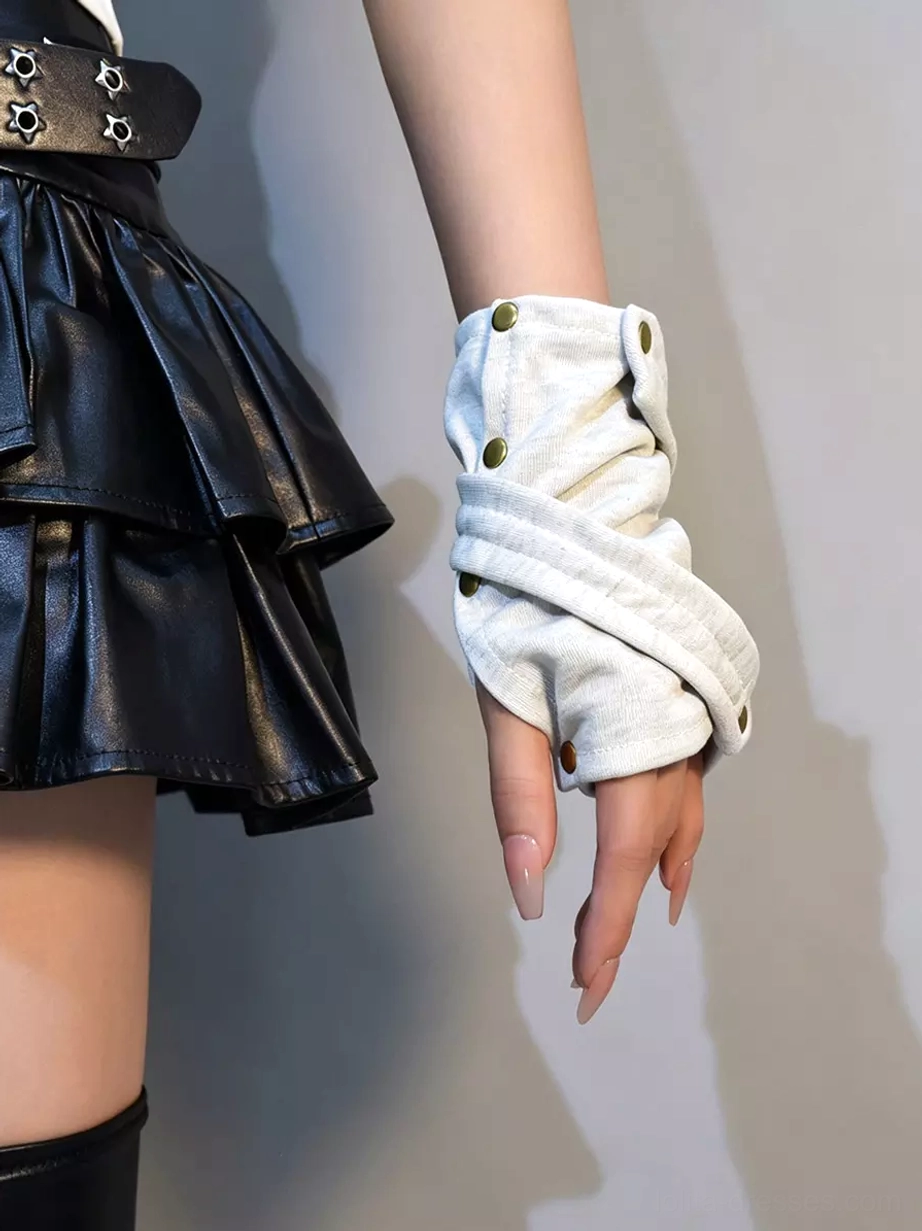 Close-up front view of light gray fingerless arm warmers featuring intricate cross wrap structure and metal snap fasteners, detailed shot showing rivet embellishments and layered fabric construction for gothic lolita aesthetic