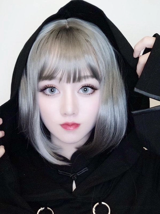 Sweet lolita short bob wig light gray color frontal close-up with neat blunt bangs and sleek bob hairstyle on model in black gothic top