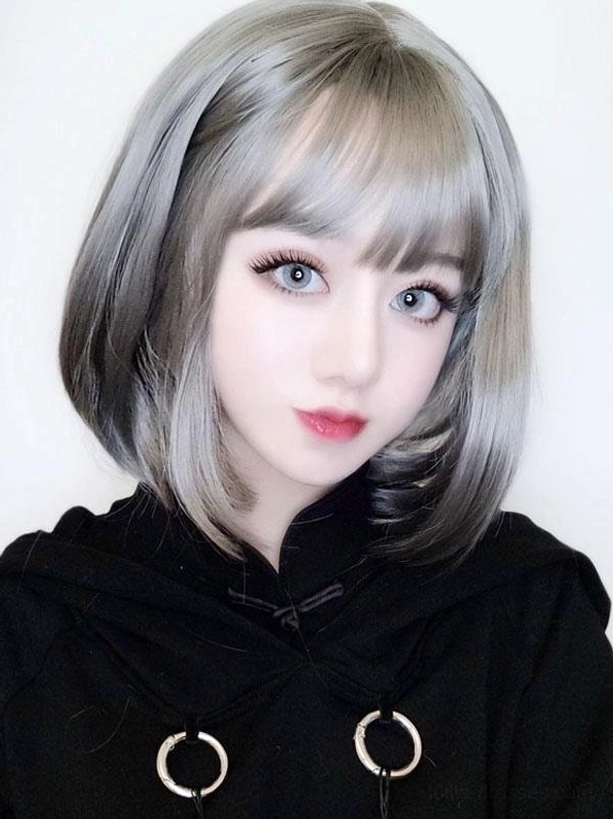 Short bob lolita wig light gray silver color with blunt bangs natural texture close-up front view on model in black chinese collar top
