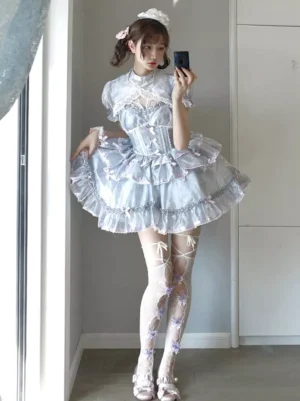 Light gray sweet lolita JSK dress with puff sleeves and layered ruffled skirt full-body side view