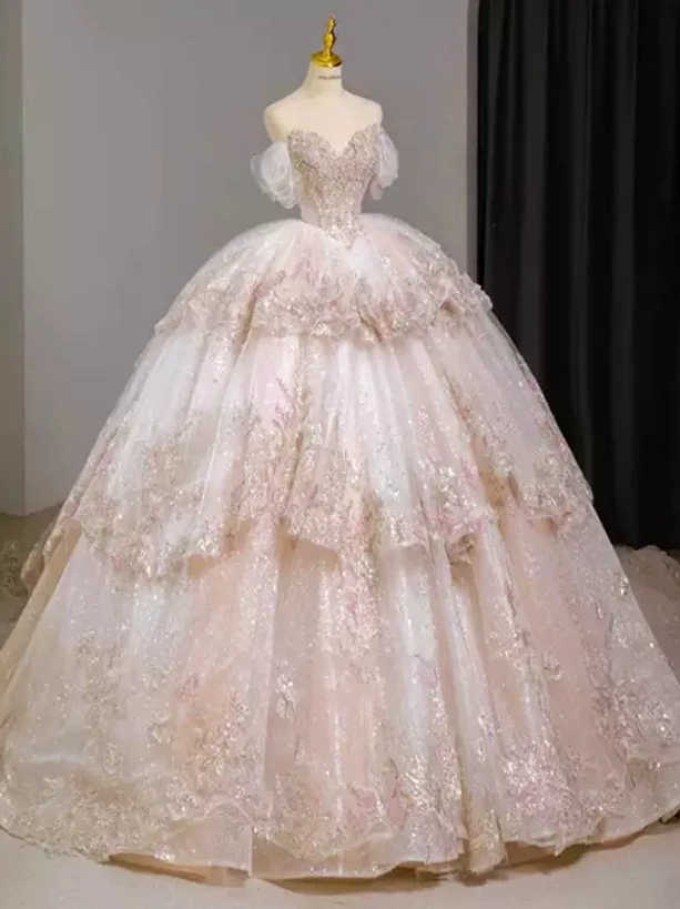 Light pink ballgown dress half body close-up sheer puff sleeves beaded sweetheart bodice pearl embellishments sweet lolita