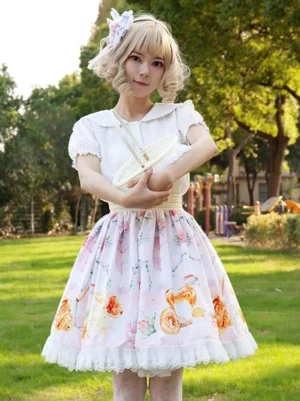 Light pink floral sweet lolita skirt with white ruffled hem front view outdoor modeling blonde girl park lawn