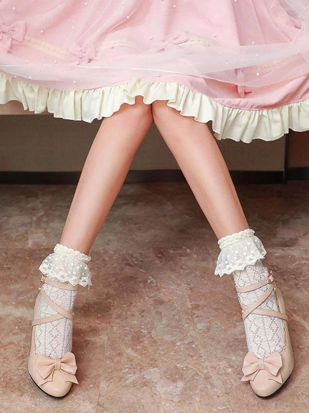 Light pink lolita high heel shoes low rear angle view showing scalloped collar and toe bow with ruffled socks