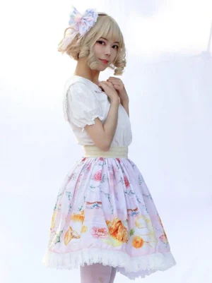 Sweet lolita skirt light pink floral print three-quarter studio view beige waistband ruffled lace trim white backdrop