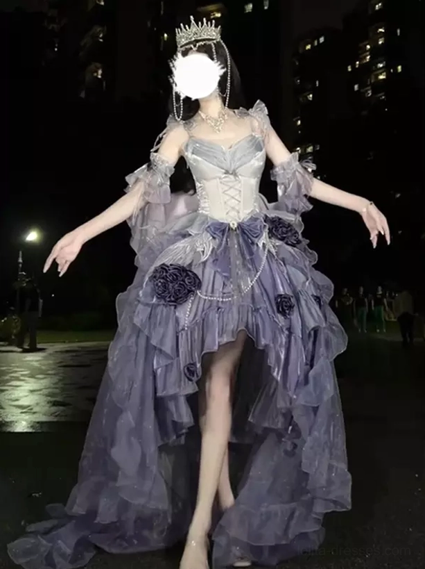 Front full view of light purple royal lolita fairy dress with crown veil headpiece and sheer off-shoulder sleeves in night outdoor street setting
