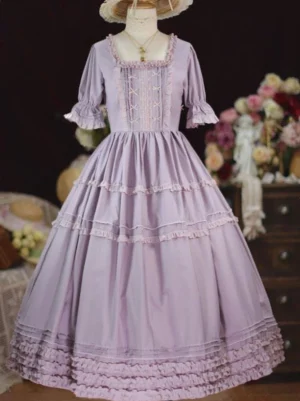 Light purple sweet lolita dress front view with square neckline tiered ruffles and short ruffled sleeves worn with straw hat and pendant necklace