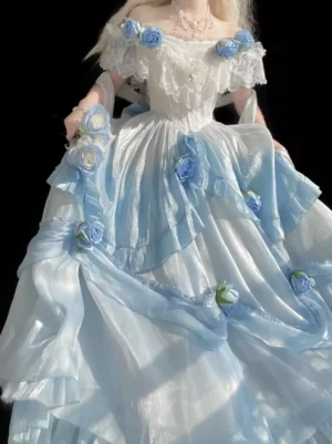 Light sky blue off-shoulder fairy Lolita princess dress with rose appliques, white lace trims, glossy satin skirt, and tiered ruffles - full three-quarter front view on blonde model