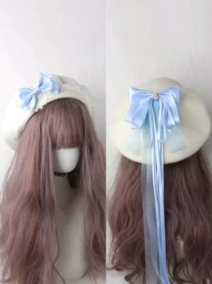 Light sky blue sweet lolita beret with satin bow and long tassel rhinestone headdress accessory front view