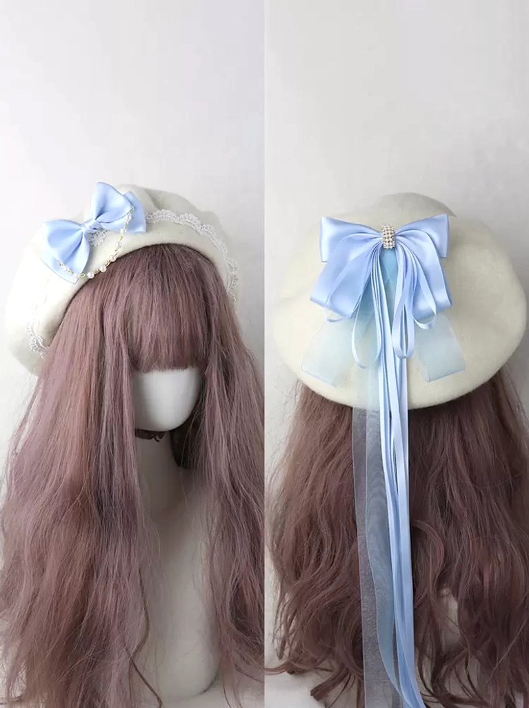 Light sky blue sweet lolita beret with satin bow and long tassel rhinestone headdress accessory front view