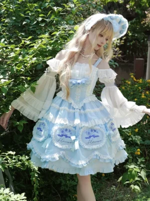 Light sky blue sweet lolita jumper skirt dress with floral print off-shoulder design tiered ruffles and embroidered patches front view