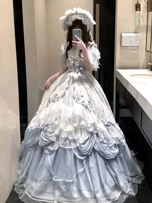 Light sky blue vintage lolita gown short flounce sleeves layered ruffle skirt flower hair crown full front view