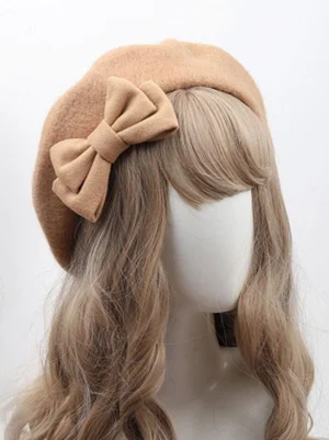 Light tan lolita beret with matching bow side front view soft felt rococo accessory
