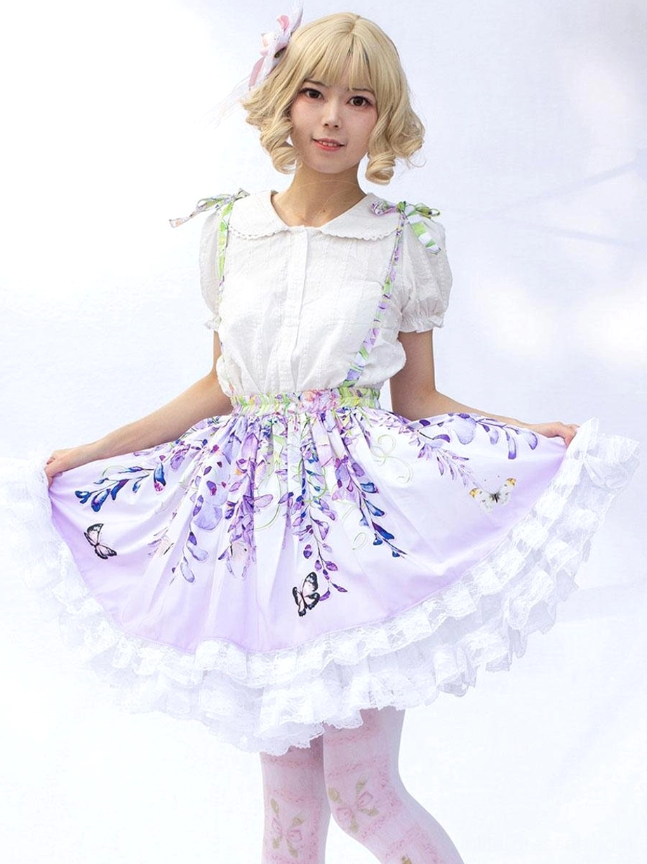 Lilac floral lolita blouse and skirt set doll collar short sleeves front side view outdoor lawn showing complete sweet lolita coordinate