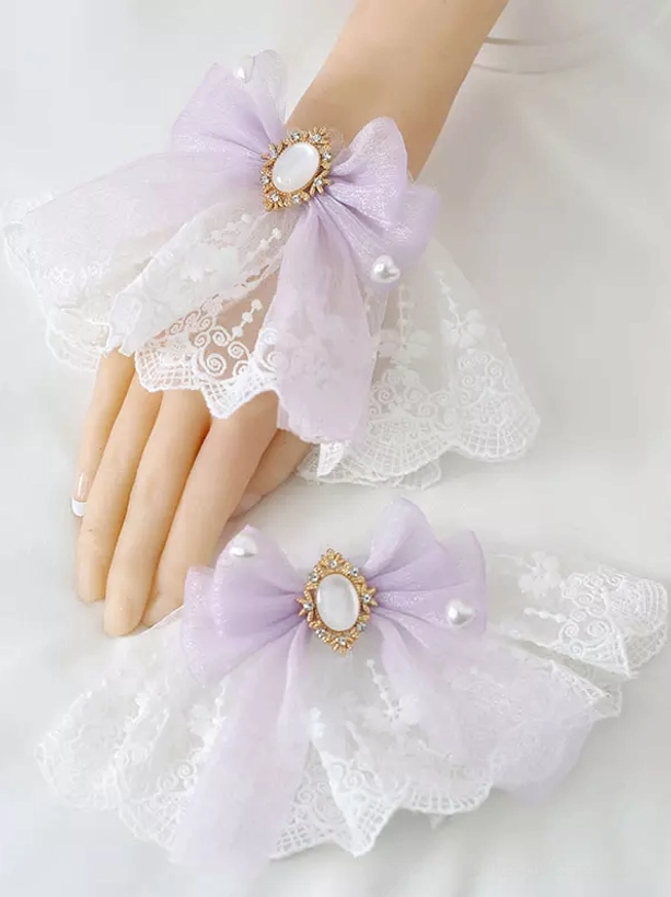 Lilac lavender organza bow lolita wrist accessory with oval white gemstone decoration and pearl-accented ruffled lace base