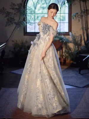 Three-quarter side view of enchanted Lolita fairy dress with ruffled off-shoulder tulle trim and gold embroidered patterns on model