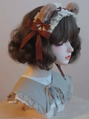 Plush bear ear lolita headdress right side profile showing large brown satin bow and beige lace headband design