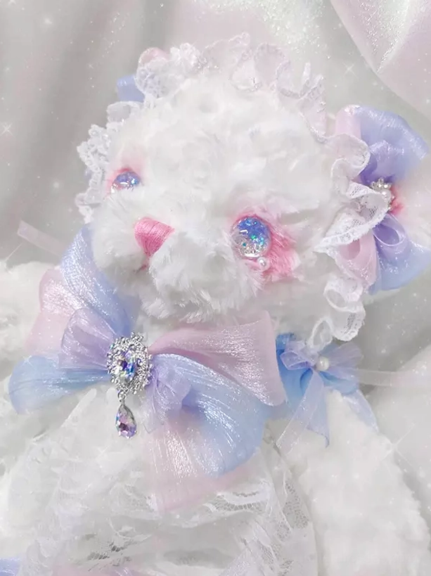 Close-up Lolita bear plush face sparkly rhinestone eyes frilly lace headdress pink nose sweet character detail