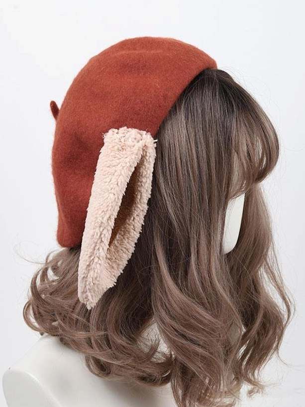 Lolita rabbit ear beret hat right side profile view showing decorative tail and fluffy ear construction detail