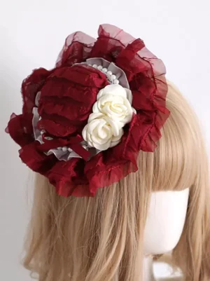 Burgundy ruffled Lolita bonnet headdress rear three-quarter view showcasing pearl and grey ribbon accents with off-white roses