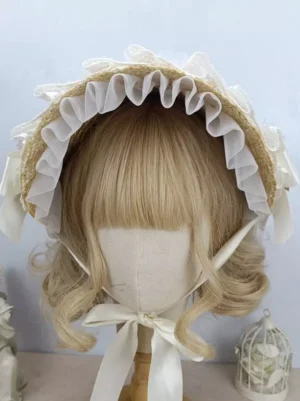 Vintage lolita headdress with mesh ruffled edge and white ribbon tie - front view on blonde curly wig mannequin