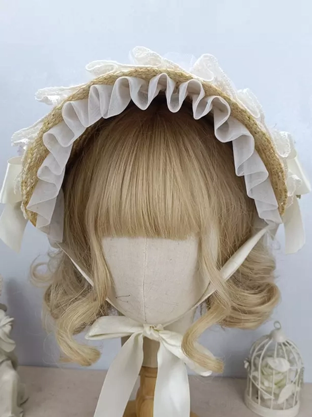 Vintage lolita headdress with mesh ruffled edge and white ribbon tie - front view on blonde curly wig mannequin