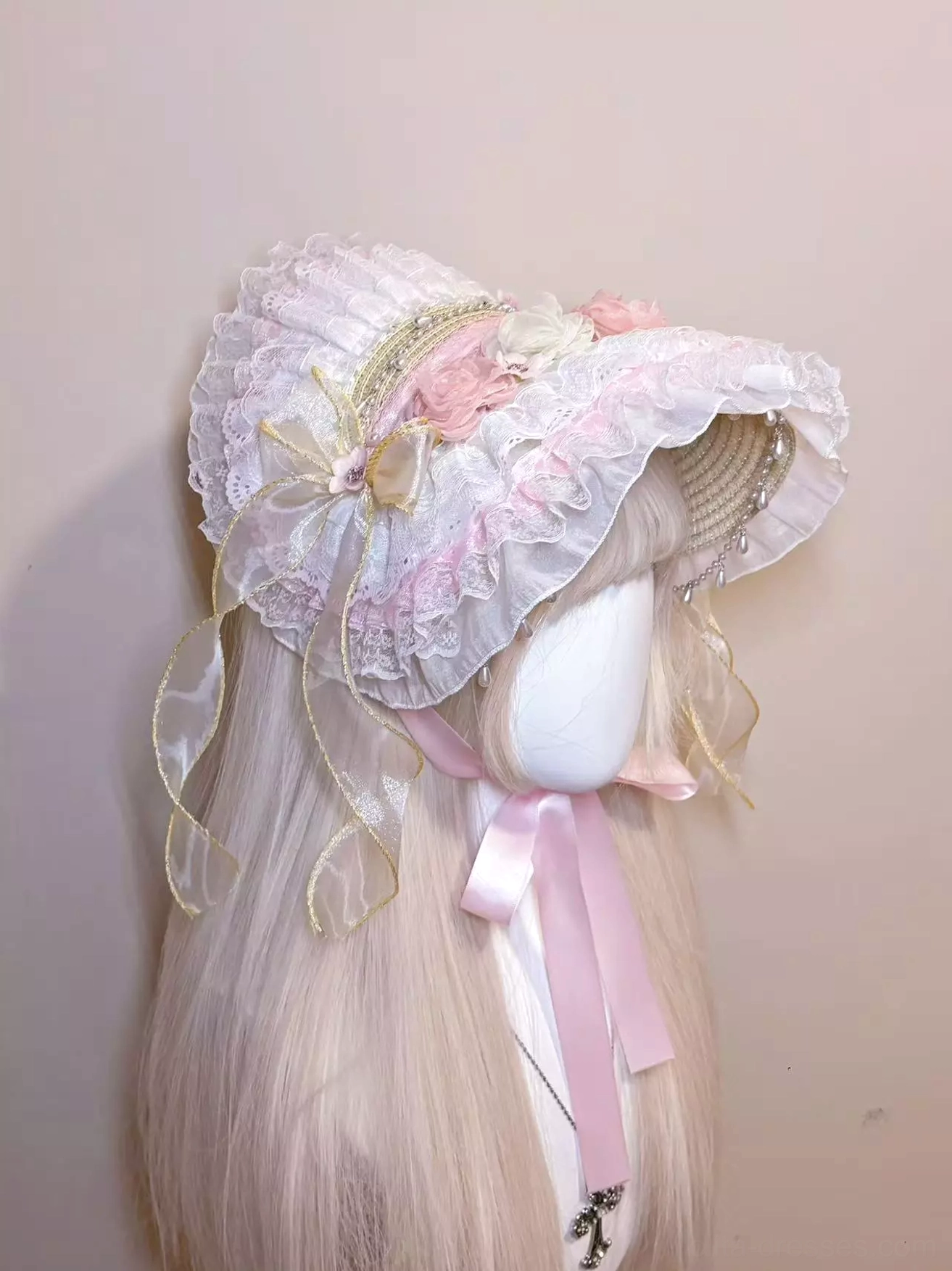 Rococo-inspired lolita bonnet headdress right side view showcasing pink-white plaid lace, ribbon bows, and adjustable pink chin straps for secure wear