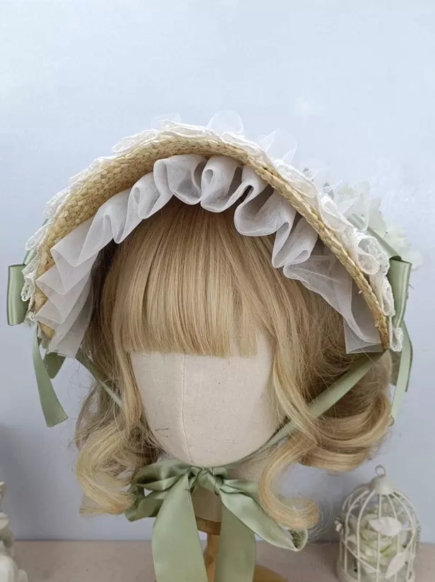 Tea party lolita headdress with sage green ribbon tie and mesh ruffled trim - front view detail shot