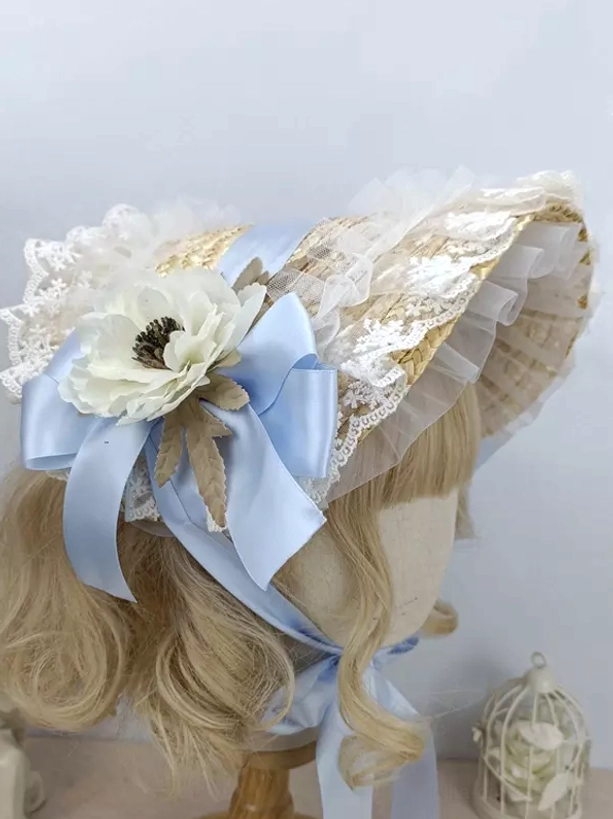 Sky blue satin bow lolita vintage bonnet with white anemone and delicate lace trim - side oblique angle