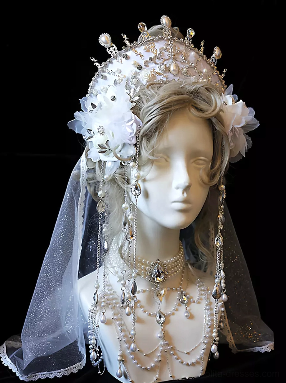 Elegant bridal crown lolita accessory left oblique angle showing silver diamond crown, fabric flower embellishments, hanging crystal bead chains, shimmer tulle veil, and coordinating pearl choker