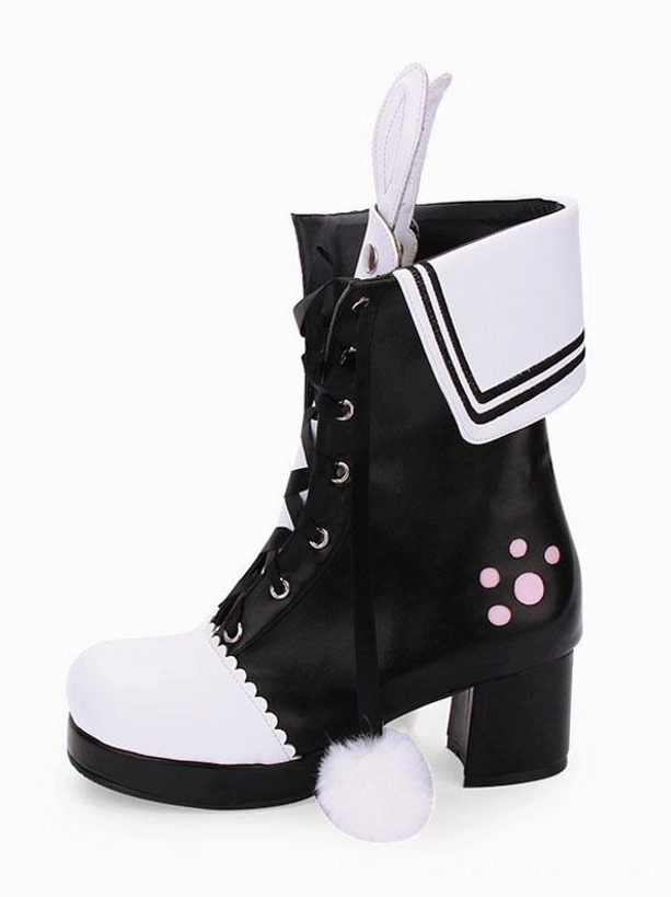 Single lolita bunny ear boot right side three-quarter view showing chunky block heel, sailor fold collar, and pom-pom embellishment