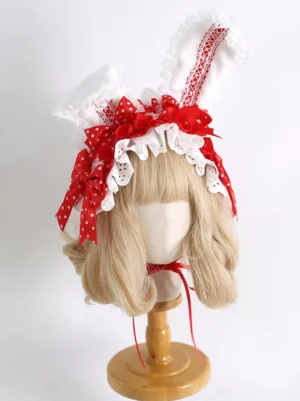 Sweet rococo lolita rabbit ear headband with red ribbon bows and white frilled lace edge front display