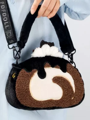 Kawaii cake roll crossbody bag worn by model wearing light blue shirt showing shoulder strap and styling wear