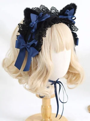 Navy bow cat ear lolita headband with black lace trim and matching neck strap displayed on mannequin front angle