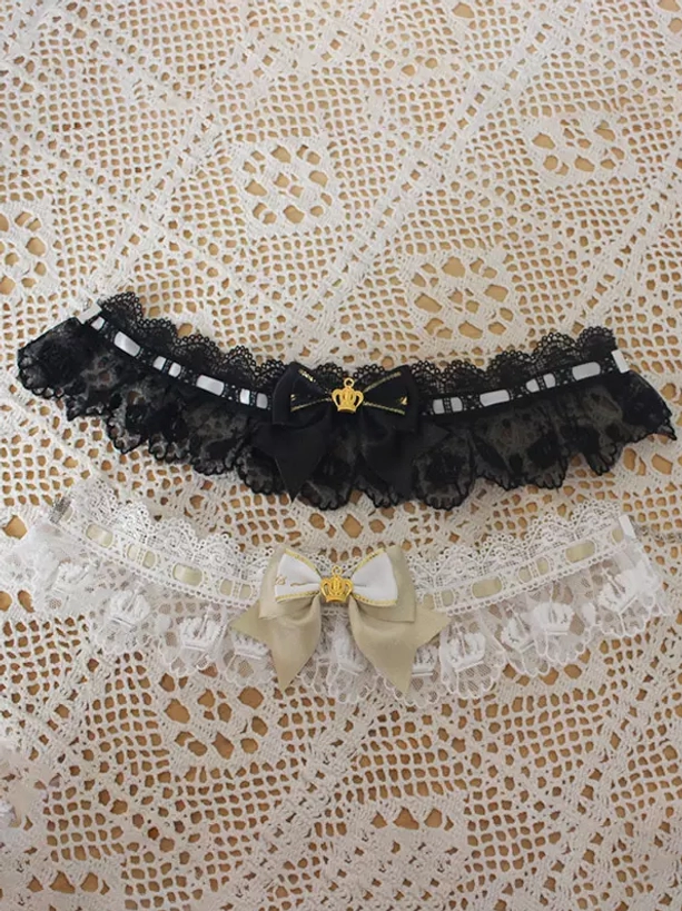 Lolita choker collection flat lay showing multiple styles black and champagne gold lace designs with crown ornaments