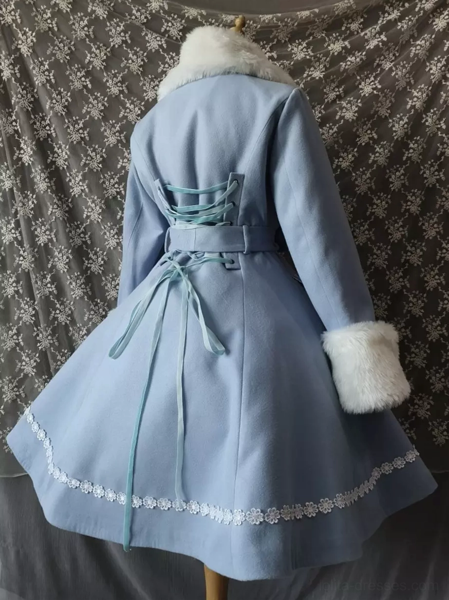 Light blue lolita coat back view showing white fur collar, decorative corset-style lace-up back detail, waist sash, lace hem trim, and fur cuffs