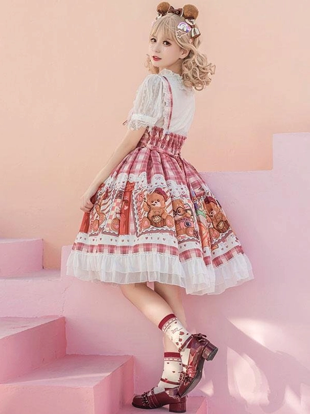 Lolita sleeveless dress back view on pink stairs with lifted leg showing mary jane shoes ruffled skirt hem and full silhouette