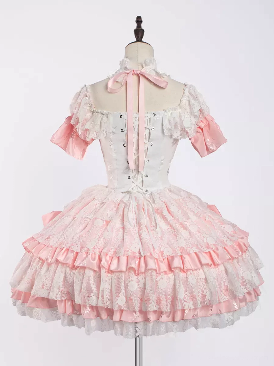 Lolita dress choker and neckline detail showing off-shoulder lace construction with pink bow accent coordinate
