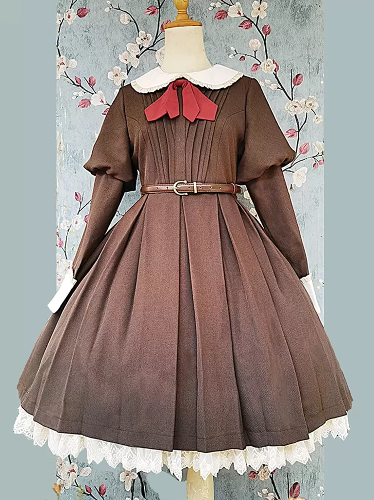 Classic lolita dress detail showcasing the intricate construction, knotted embellishment, layered lace trim, and craftsmanship of this traditional style