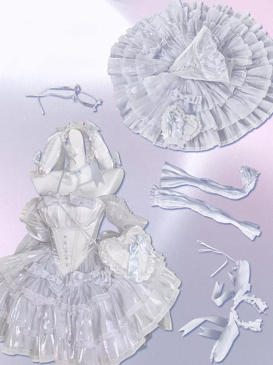 Fairy lolita dress fabric and construction detail highlighting premium polyester sheen, delicate ruffles, lace-up bodice detailing, and embellishment quality