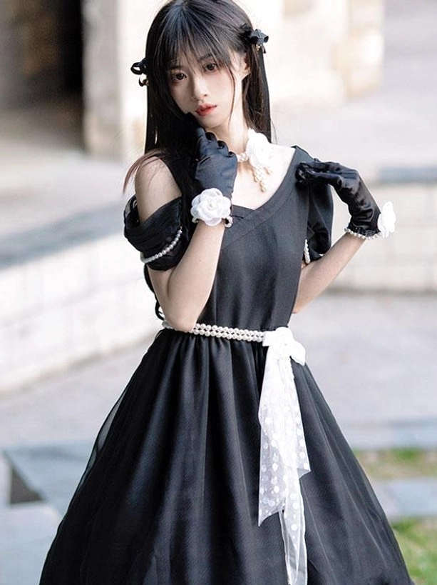 Sweet lolita short-sleeve dress side front view with square neckline polka-dot white sash and pearl waist belt detail