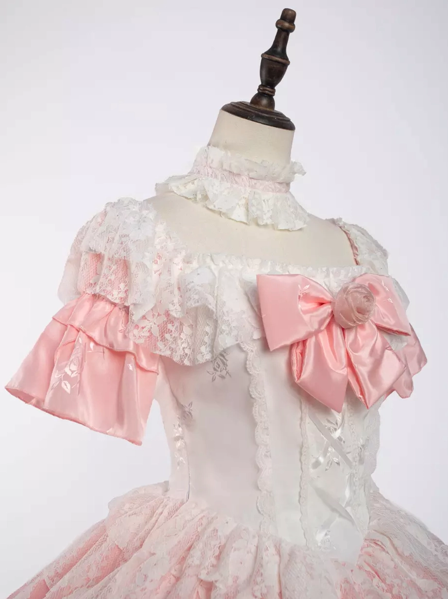 Sweet lolita dress skirt volume and lace tier construction showing multiple layers and ruffle embellishments detail