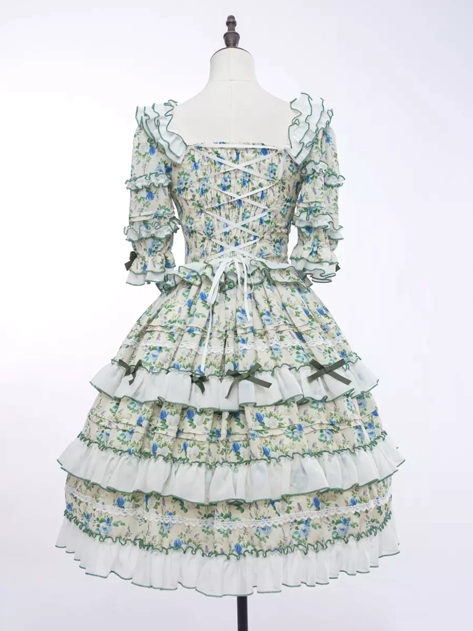 Vintage inspired lolita dress floral motif ruffled silhouette green accents authentic lolita fashion aesthetic