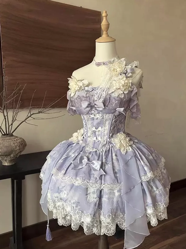 Purple lolita dress on dress form displaying front full view with single spaghetti strap floral lace appliques and corset structure