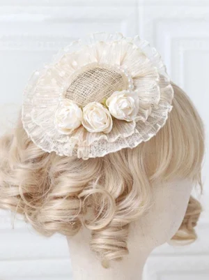 Lolita mini fascinator headdress with off-white rose ornaments and lustrous pearl embellishments displayed on mannequin head, back upper side angle showing refined craftsmanship and delicate mesh base