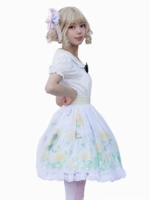 Lolita floral print skirt side back view white background blonde model pink hair bow chest ornament ruffle lace hem