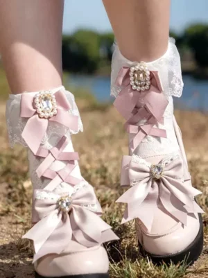 low angle outdoor grassland leg shot lolita ankle socks pink satin bows large rhinestone decoration white ruffled lace