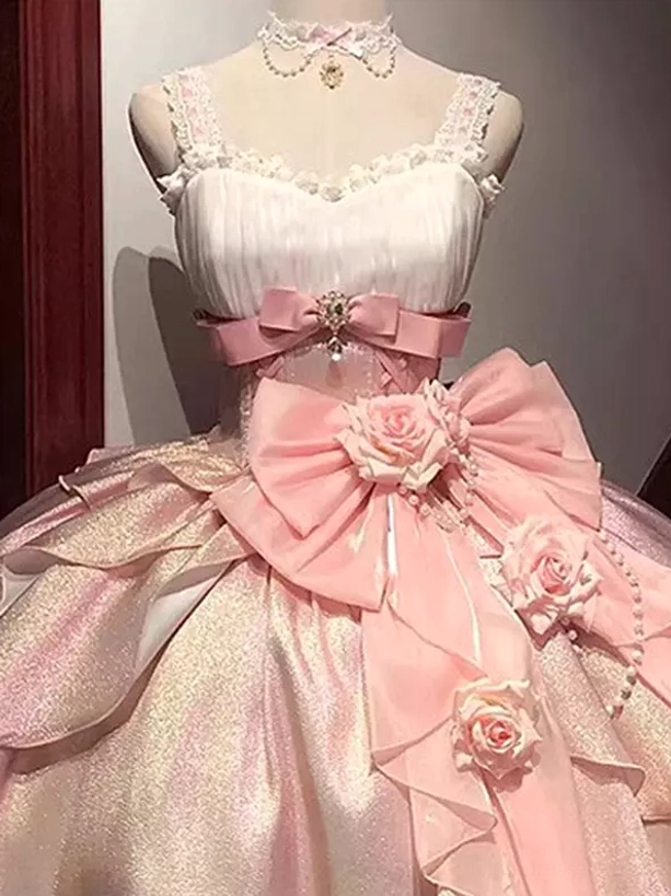 sweet lolita formal gown with layered pink tulle skirt and large waist bow detail close angle view