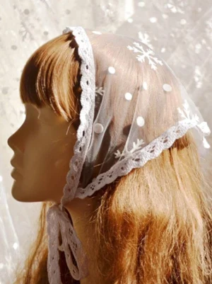 Lolita head veil white ruffled lace edge left side profile view long brown hair sheer fabric polka dot snowflake patterns adjustable tie straps